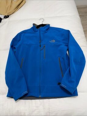 The North Face Men’s Bright Blue Lightweight Softshell Jacket